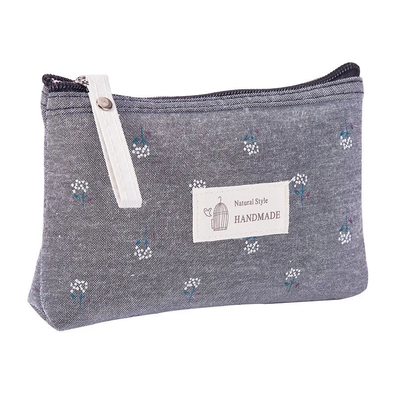 trousse de toilette fleurie Gris
